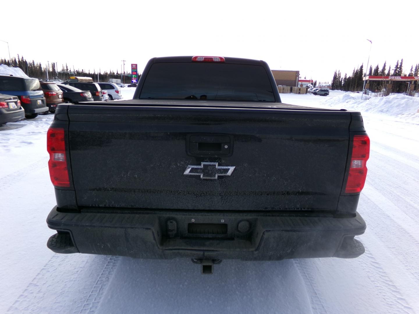 2016 Black Chevrolet Silverado 1500 LT Crew Cab 4WD Z71 (3GCUKREC4GG) with an 5.3L V8 OHV 16V engine, 6A transmission, located at 2630 Philips Field Rd., Fairbanks, AK, 99709, (907) 458-0593, 64.848068, -147.780609 - Photo#3